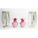 A pair of late 19th/early 20th century glass lustres, of typical form, with recurrent ogee form