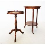 A 19th century mahogany occasional table, the circular moulded top raised upon fluted supports,