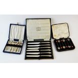 A cased set of six silver teaspoons, H Bros Birmingham 1952, each with rhombus pierced terminal, 9.