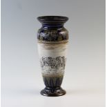A Doulton Lambeth vase designed by Hannah Barlow, of baluster form and externally sgraffito