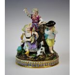 A Meissen porcelain figural group 'Five Children Making Music', 19th century, polychrome enamelled