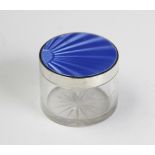 A silver and blue enamel topped dressing table jar, Goldsmiths & Silversmiths Birmingham 1934, of