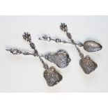Four Italian silver relief moulded figural spoons, 19th century, two spoons with square form bowls