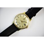 A Gentlemen's Omega Seamaster wristwatch, the circular champagne coloured face with baton dial and