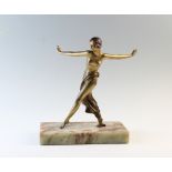 An Art Deco spelter figure, early 20th century, the gilt patinated figure modelled as a girl