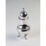 An Edwardian silver sugar caster, Charles Boyton & Sons Ltd, London 1909, in George III baluster