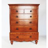 An early 19th century mahogany chest on stand, with an arrangement of two short and three long