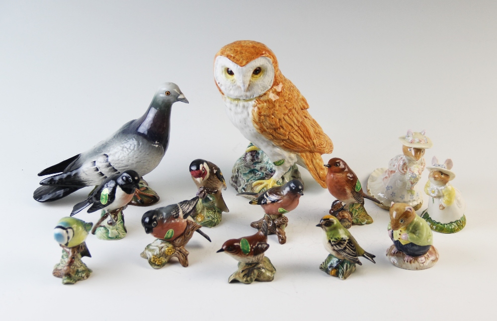 A Beswick model of a pigeon, model no.1383, a Beswick model of a barn owl, model no.1046, eight