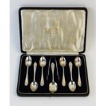 A set of six George V silver teaspoons with sugar tongs and caddy spoon, Josiah Williams & Co,