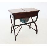 A 19th century mahogany ladies work table, the rectangular table with twin hinged compartments