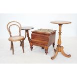 A Victorian mahogany circular occasional table, on a baluster ring turned pedestal with three down