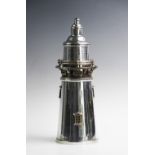 A 20th century silver plated lighthouse cocktail shaker, bearing mark for E.G. Webster, the