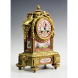 A 19th century French ormolu and pink porcelain inset 8-day mantel clock, movement by Japy Freres,