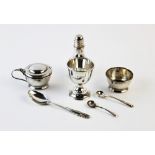 A cased silver condiment set, E J Houlston Birmingham 1922, each of cylindrical form, comprising