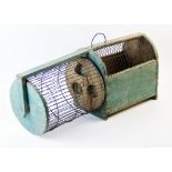 A 19th century French painted pine hamster or mouse cage with attached wheel, the arched cage with