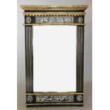 A Regency style pier mirror, painted in black with gilt highlights in a neoclassical style, 141cm