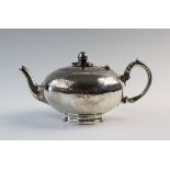 A Victorian silver teapot, William Robert Smily, London 1853, the teapot of compressed spherical