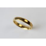An 18ct yellow gold wedding band, ?DOM?, 4mm wide, gross weight 6.1gms