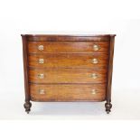 A Regency mahogany bow front chest of drawers, the shaped top above four graduated and cock beaded