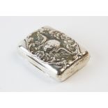 A Victorian silver box, Charles Henry Dumenil London 1899, the cover cast with a cherubs head within