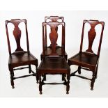 A set of four 18th century oak dining chairs, stamped 'L T M', each with a vase shaped splat above a
