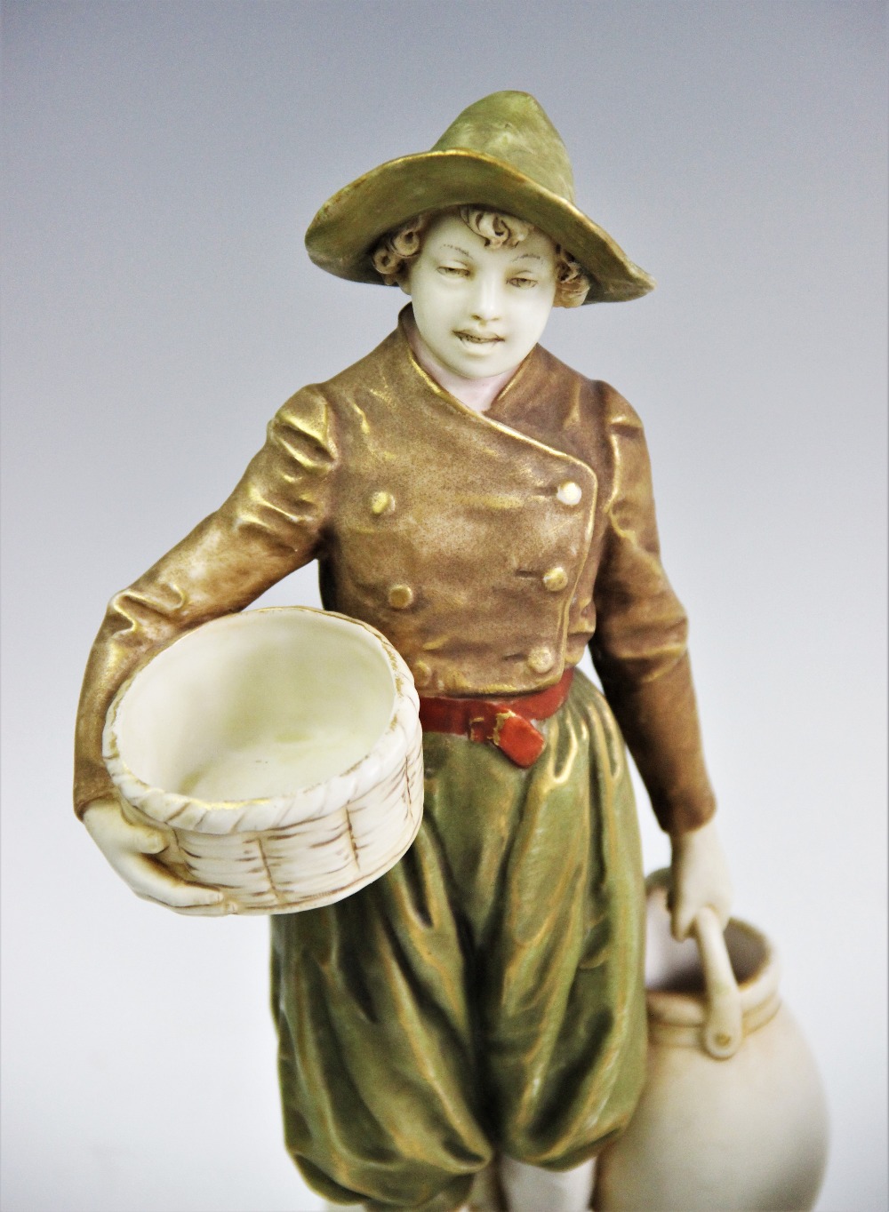 An Ernst Wahliss porcelain figurine, late 19th/early 20th century, modelled as a flower boy - Image 2 of 4