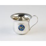 An Arts & Crafts silver and enamelled mug, James Fenton & Co Birmingham 1905, of plain polished