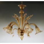 A five branch Venetian glass chandelier, mid 20th century, the chandelier of gold tinted glass,