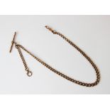 A 9ct gold graduated curb link Albert chain, with T bar and swivel clasp, gross weight 26gms, 39cm