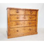 A Victorian satin birch chest of drawers, the rectangular top above two short and three long