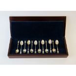 A cased set of twelve French silver teaspoons, each bowl engraved with a French town, including;