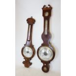 A mid 19th century walnut banjo wall barometer, the onion shaped top with 'C' scroll moulded detail,