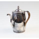 An old Sheffield plate Argyll, of barrel form, with gadrooned rims and reeded handle, 16.5cm high (