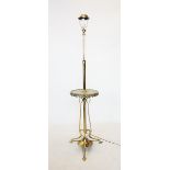 An early 20th century brass and onyx standard lamp table, the telescopic lamp with a circular onyx