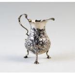 A George III silver milk jug, Nathaniel Appleton & Ann Smith, London 1770, of typical form, on