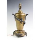 A Hicks lizard table lamp, of tapering form applied with bronzed naturalistic loop handles and a