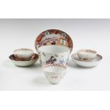 A Chinese porcelain bowl, decorated in famille rose enamels with figures in a garden, 8.5cm high,