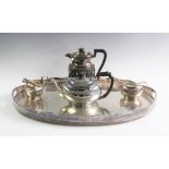A matched silver tea service, comprising; a silver teapot Atkin Brothers Sheffield 1921, with