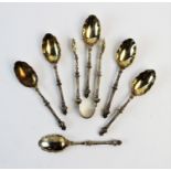 A cased set of six Victorian silver teaspoons and sugar nips, Charles Edwards, London 1891, each