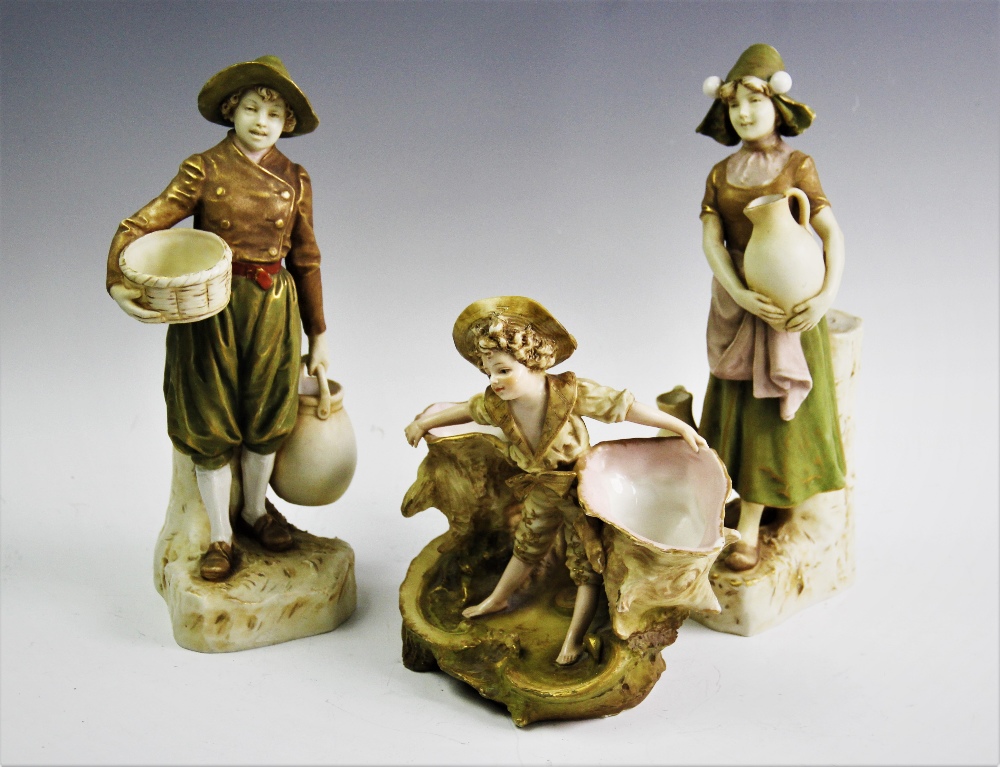 An Ernst Wahliss porcelain figurine, late 19th/early 20th century, modelled as a flower boy