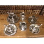 A collection of silver plated wares, to include, a Walker & Hall three piece tea service,