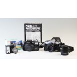PHOTOGRAPHY INTEREST: A Minolta X-300 35mm single lens reflex camera body and Minolta 50mm f1.7 lens