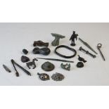 A collection of Roman Empire and later artefacts, to include a Roman white metal pendant, 4cm