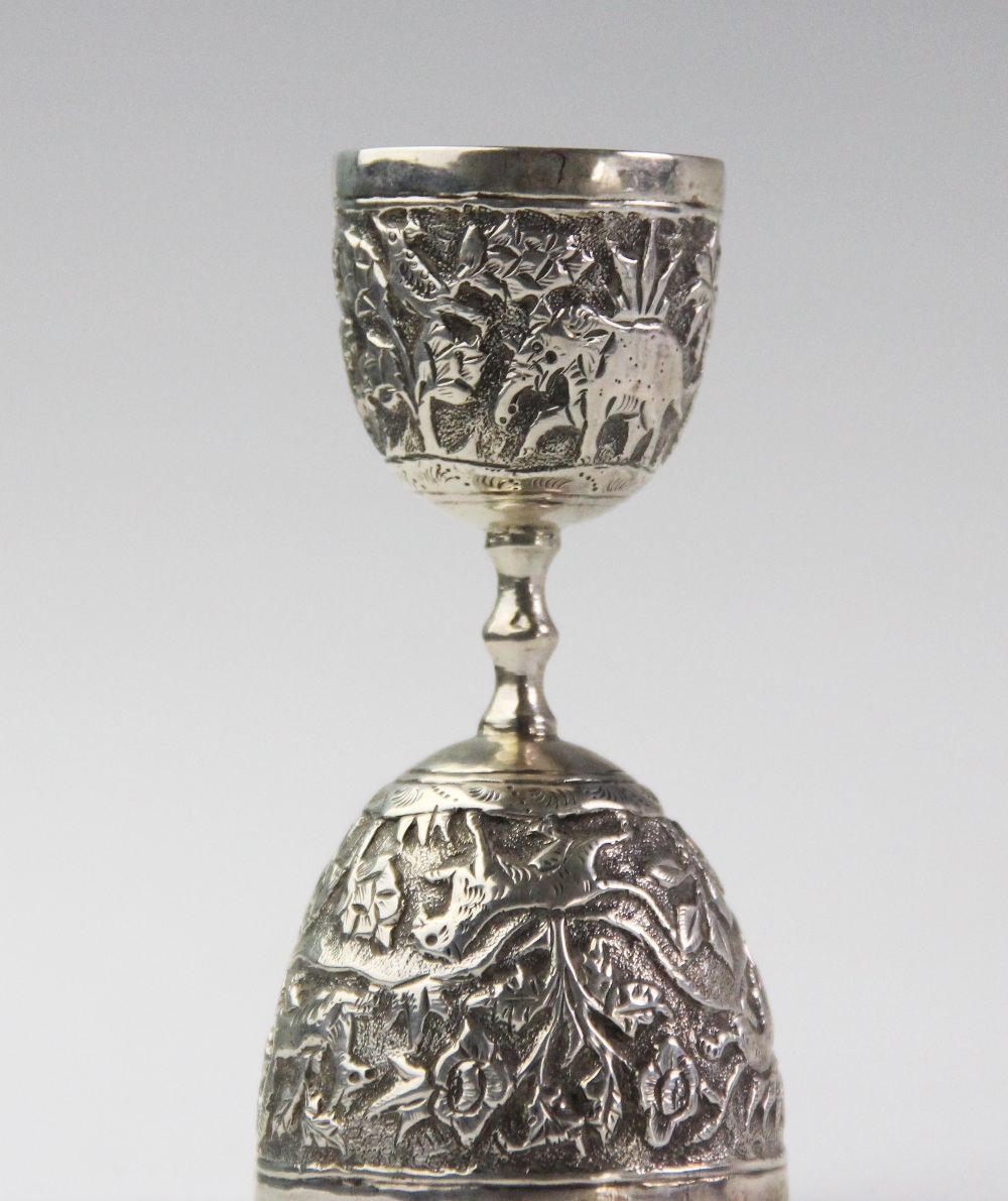 An Anglo-Indian silver double egg or wager cup, each bowl chased with a continuing landscape of - Image 4 of 4