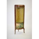 A reproduction French style freestanding corner display cabinet, by H & L Epstein, the single convex
