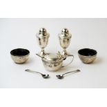 A George V five piece silver condiment set, Edward Barnard Sons Ltd, London 1912, each piece of