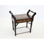 An Edwardian Italian influence stained hardwood piano stool, the turned hand rails enclosing the