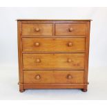 A Victorian satinwood chest of drawers, the rectangular thumb moulded top with rounded front