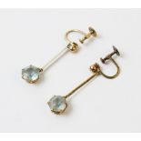 A pair of early 20th century aquamarine drop earrings, each comprising a round mixed cut