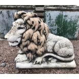 A large Henri Studio lion statue, modelled recumbent and with coloured details, stamped and numbered